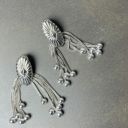 TOGA/Metal motif earrings