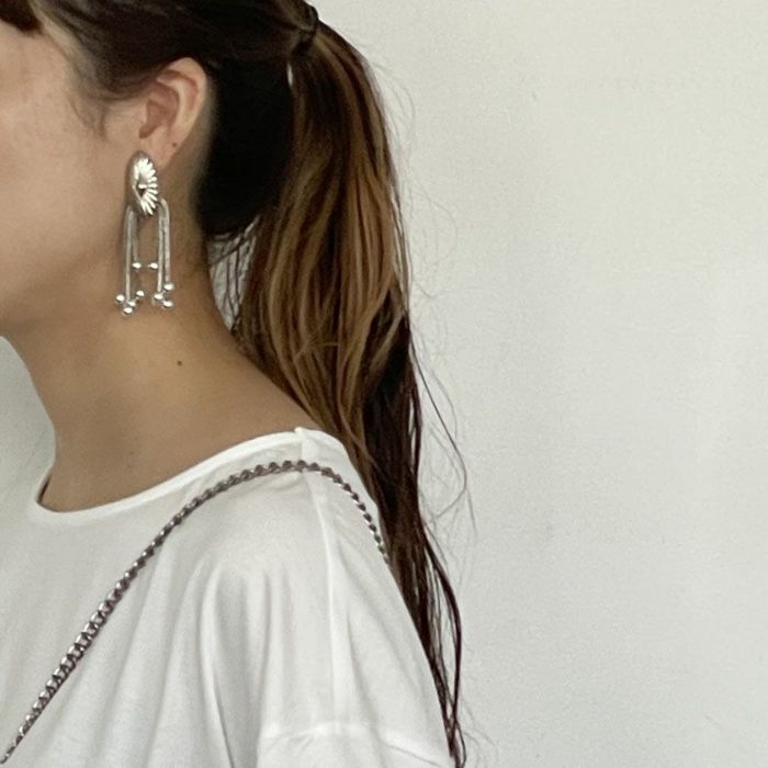TOGA/Metal motif earrings
