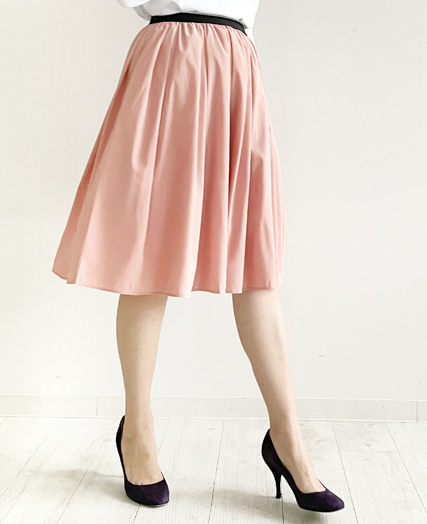 トレコード(TRECODE)黒ゴムフレアスカートピンクカラーロング丈