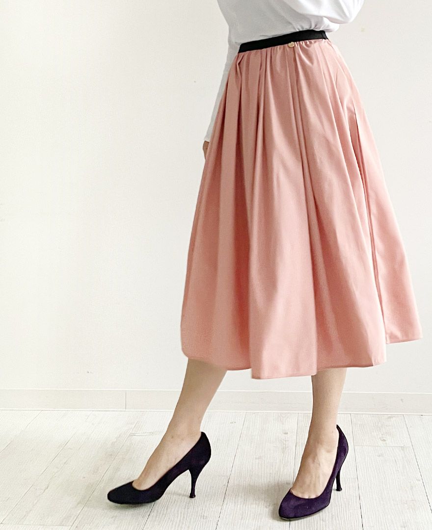 トレコード(TRECODE)黒ゴムフレアスカートピンクカラーミモレ丈