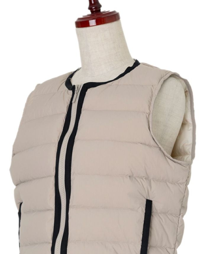 TRECODE トレコード ベストにもライナーにも使えるあったか大人可愛いペプラムライトベスト