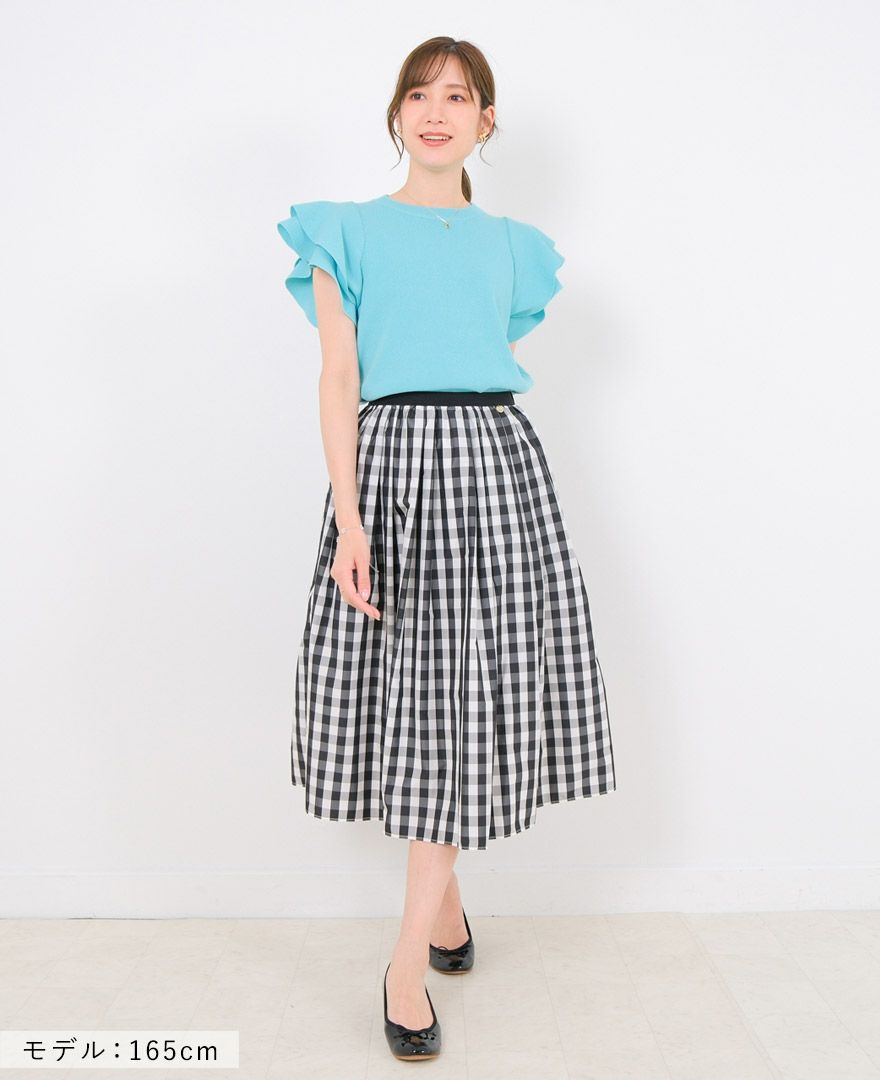 袖フリルニットブラックの着用画像