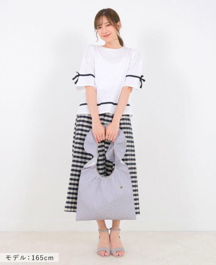 TRECODEのジャガード生地が上品さをプラスしてくれるドット柄のフリルバッグ。