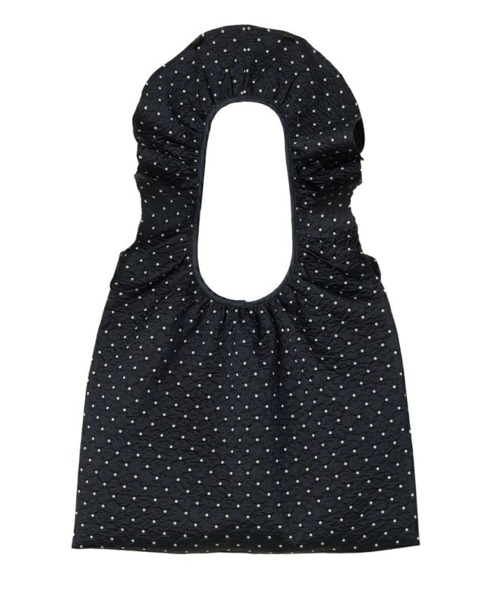 TRECODEのジャガード生地が上品さをプラスしてくれるドット柄のフリルバッグ。